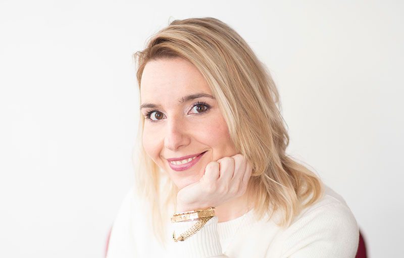 Smiling woman with blonde hair
